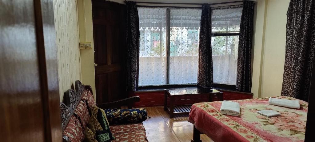 Postel nebo postele na pokoji v ubytování The River View Homestay
