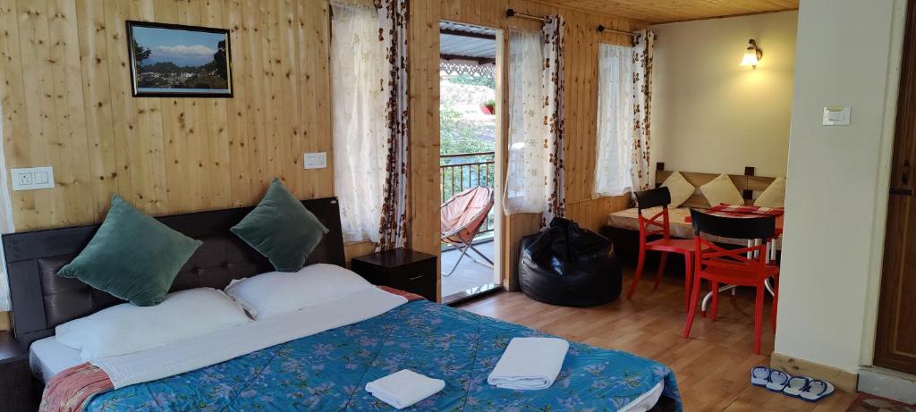 Postel nebo postele na pokoji v ubytování The River View Homestay