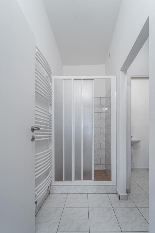 Koupelna v ubytování Apartment Yogiam