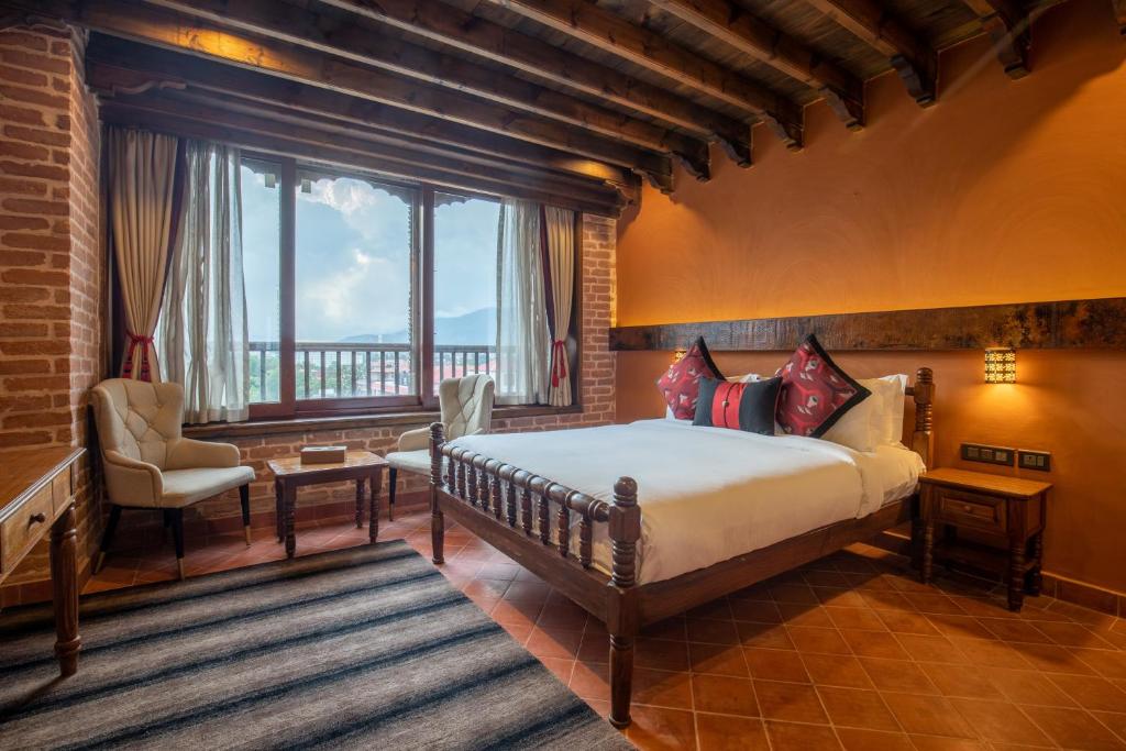 Postel nebo postele na pokoji v ubytování Basera Boutique Hotel