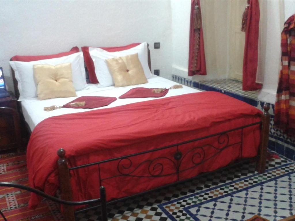 Postel nebo postele na pokoji v ubytování Riad Azrou