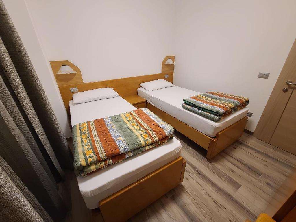 Postel nebo postele na pokoji v ubytování Al Toscana