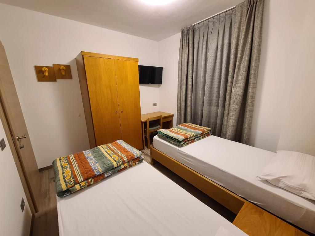 Postel nebo postele na pokoji v ubytování Al Toscana