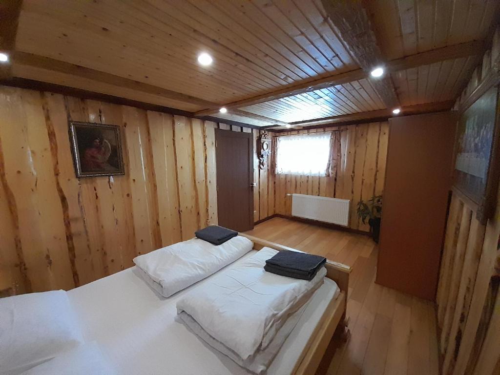 Postel nebo postele na pokoji v ubytování Pid Goroyu