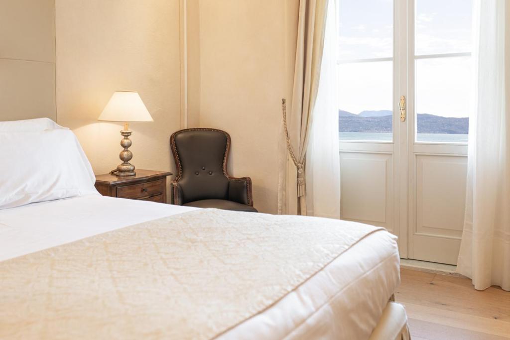 Postel nebo postele na pokoji v ubytování Grand Hotel Fasano