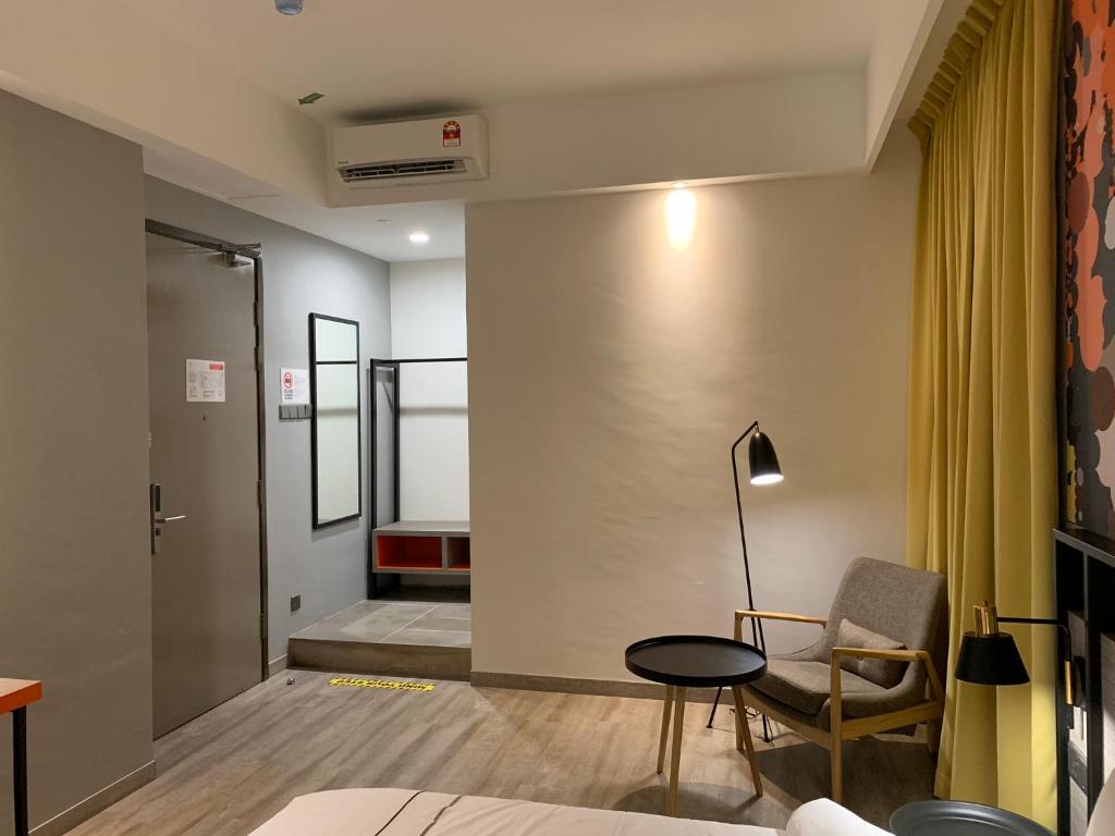Postel nebo postele na pokoji v ubytování K Hotel