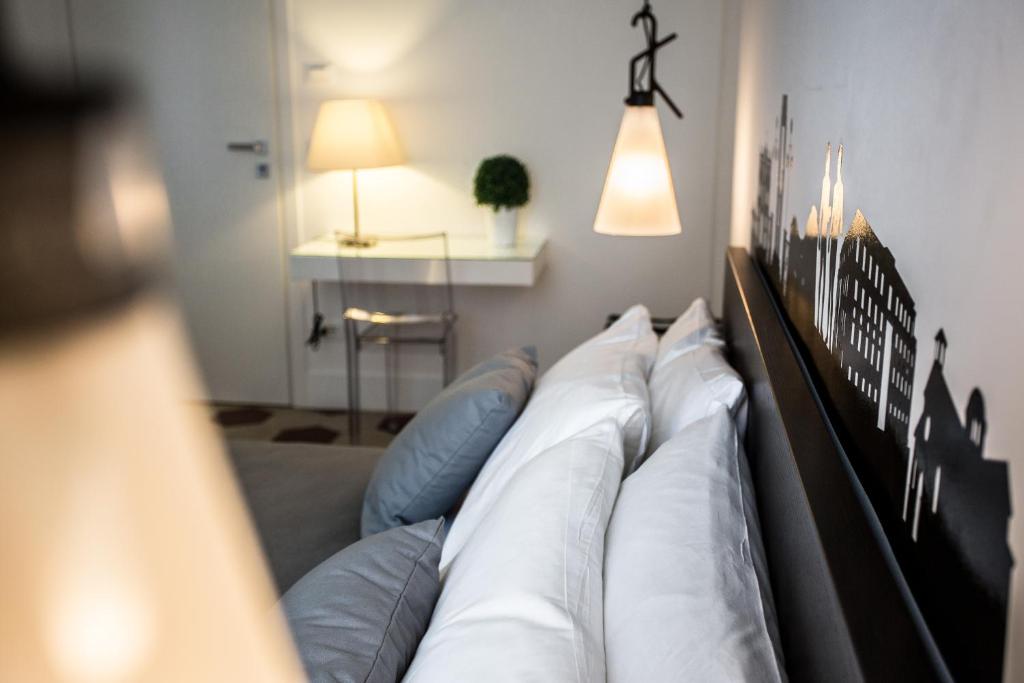 Postel nebo postele na pokoji v ubytování Rhegion B&B
