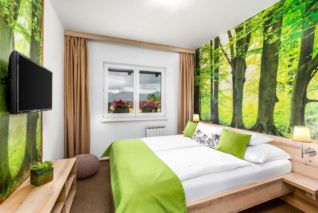 TV a/nebo společenská místnost v ubytování Hilson Jasna - Garden resort