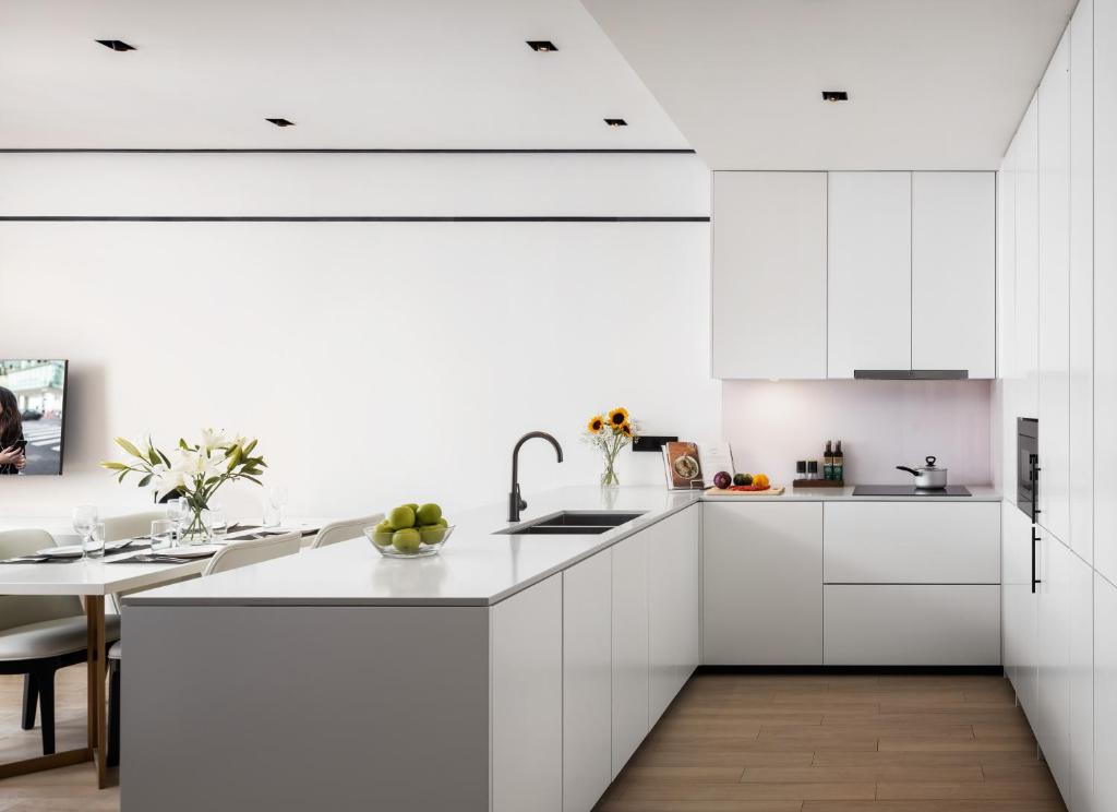 Kuchyň nebo kuchyňský kout v ubytování Citadines Flatiron Phnom Penh