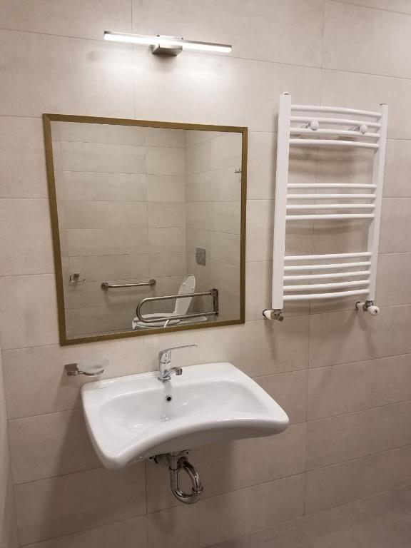 Koupelna v ubytování Paliani Hotel