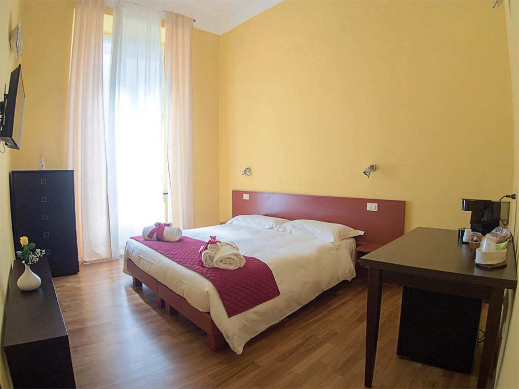 Postel nebo postele na pokoji v ubytování Residenza Viani Guest House