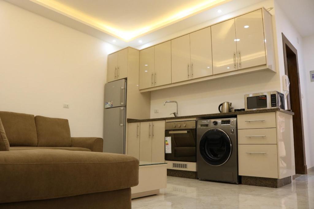 Kuchyň nebo kuchyňský kout v ubytování Executive Apartments