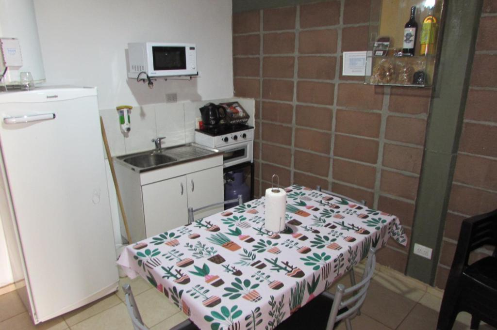 Kuchyň nebo kuchyňský kout v ubytování Cabaña en Belén