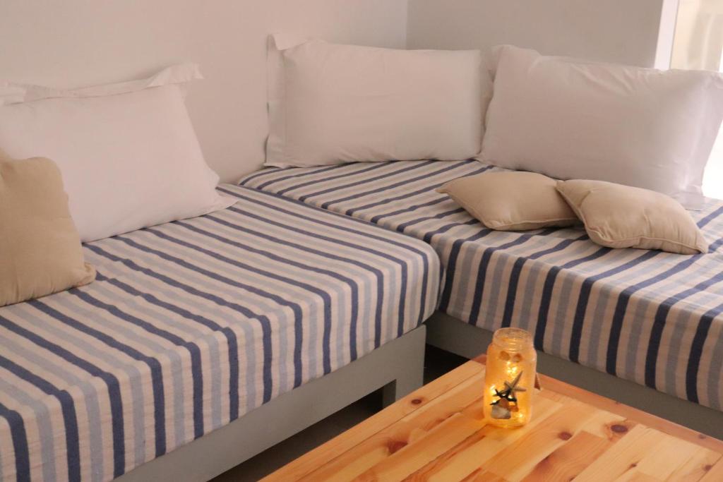 Uma cama ou camas num quarto em Apartments Piazza