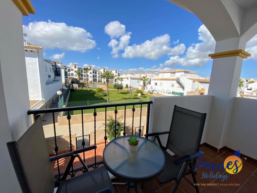 A balcony or terrace at La Ciñuelica R14 1st Floor Apartment Com Pool L182