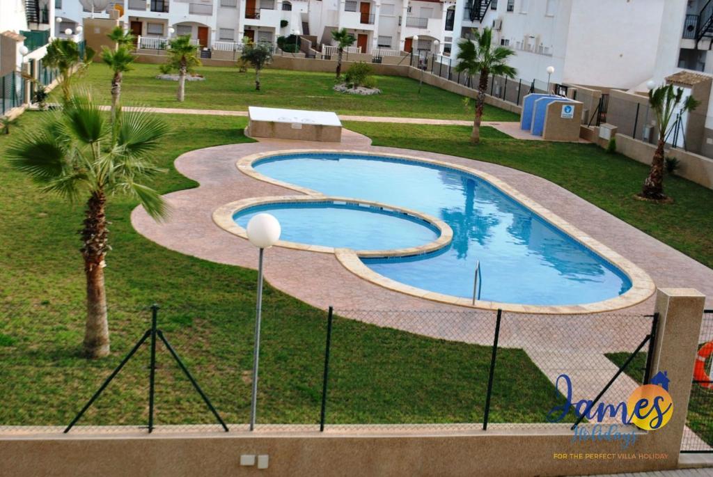 The swimming pool at or close to La Ciñuelica R14 1st Floor Apartment Com Pool L182