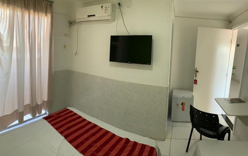 TV a/nebo společenská místnost v ubytování Hotel Mirante B