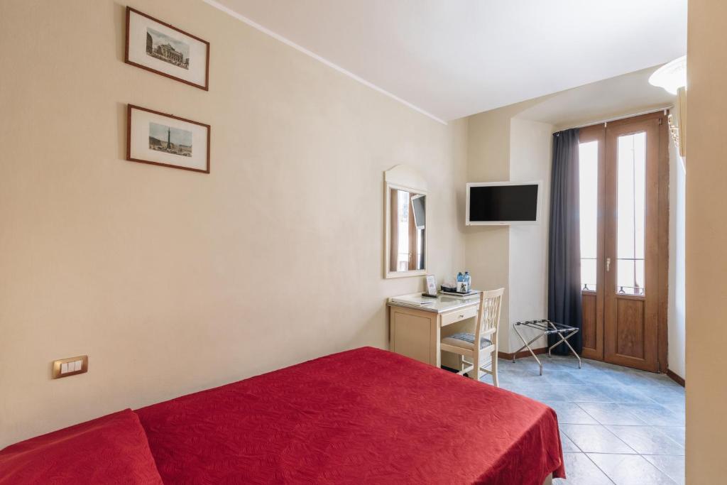 TV a/nebo společenská místnost v ubytování Hotel Astoria