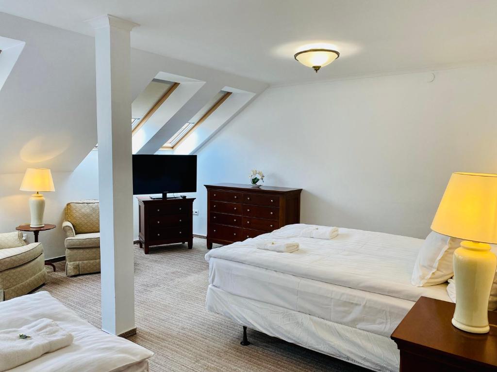 Posteľ alebo postele v izbe v ubytovaní OPERA16 Guestrooms