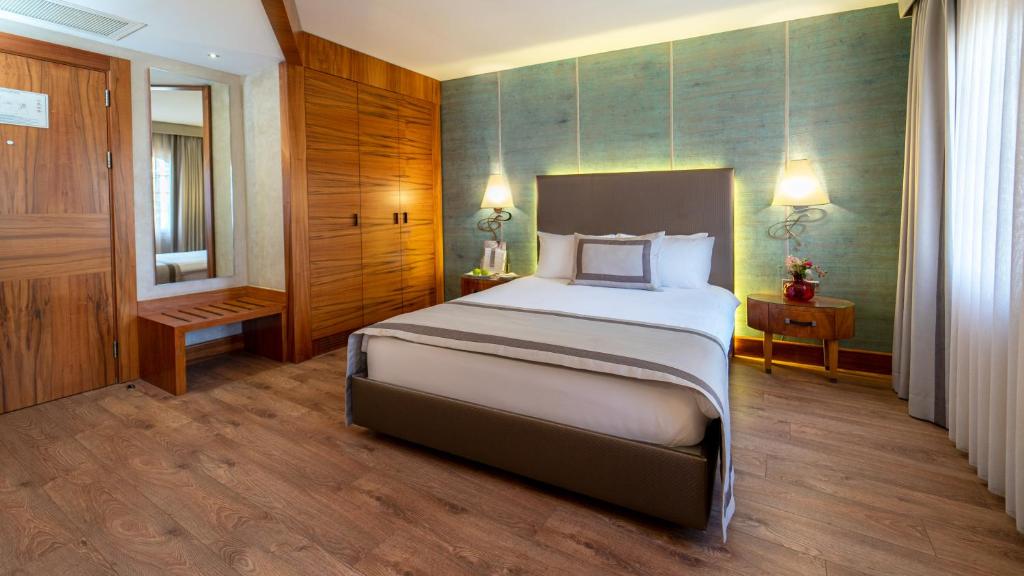 Postel nebo postele na pokoji v ubytování Biz Cevahir Hotel Sultanahmet