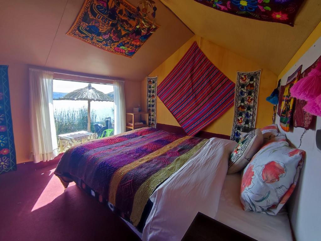 Postel nebo postele na pokoji v ubytování Quechua lodge Titicaca