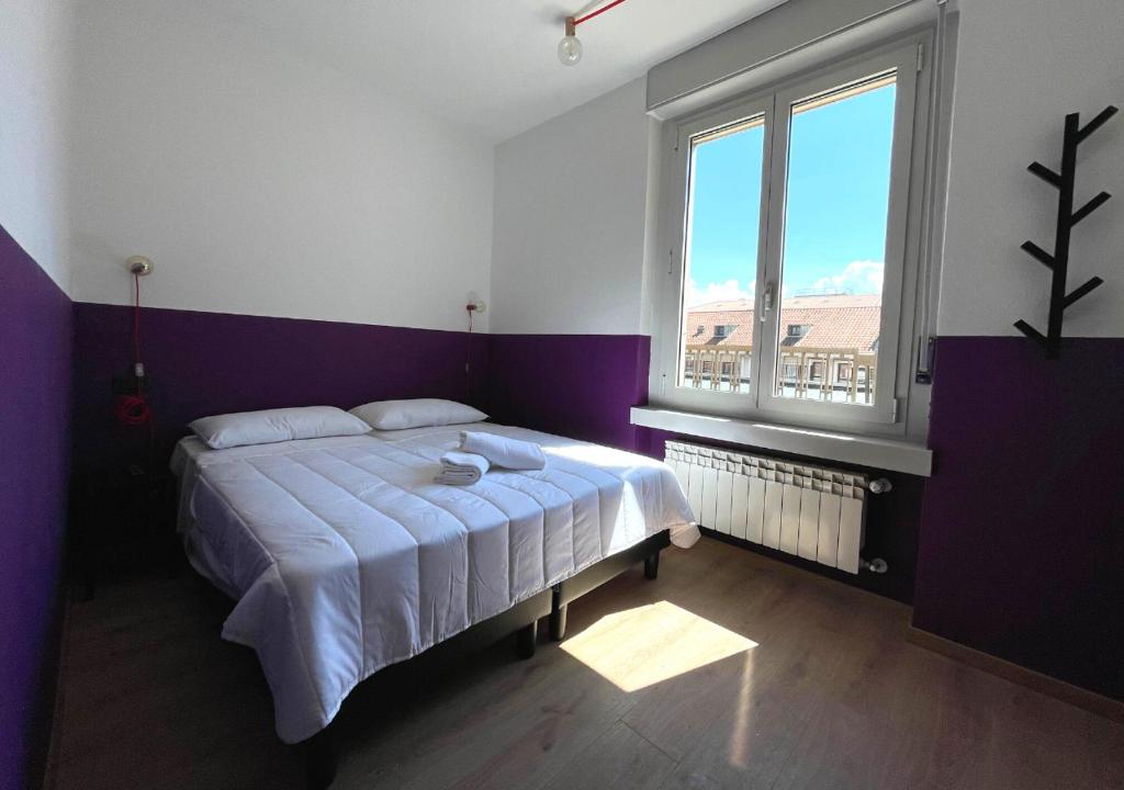Postel nebo postele na pokoji v ubytování Hotello Hostel