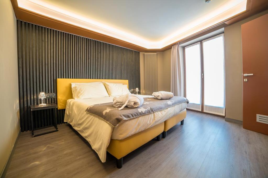 Postel nebo postele na pokoji v ubytování Hotel Europa