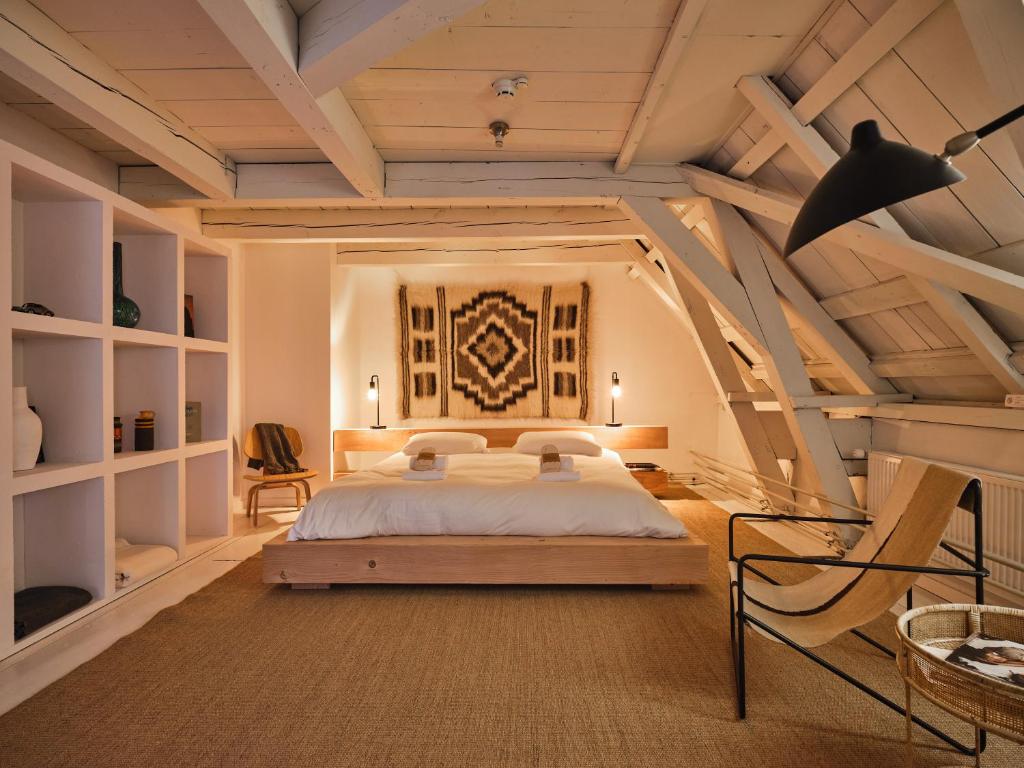Postel nebo postele na pokoji v ubytování Eco Hotel Plantage Rococo