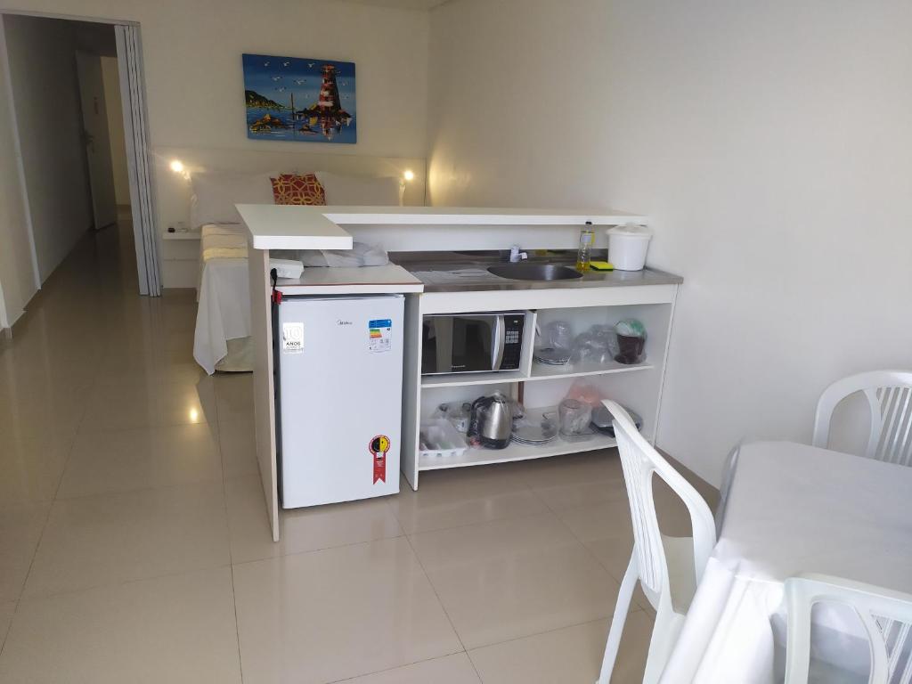 A cozinha ou cozinha compacta de Pousada Pedras do Mariscal