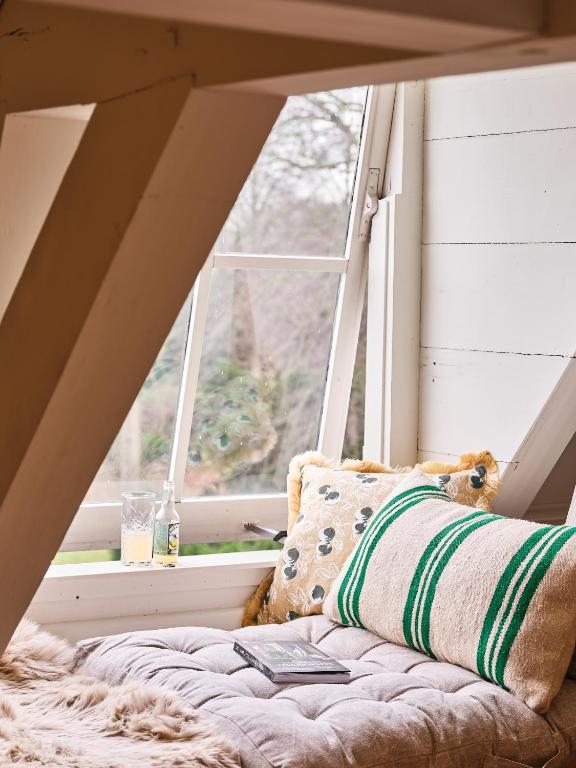 Postel nebo postele na pokoji v ubytování Eco Hotel Plantage Rococo