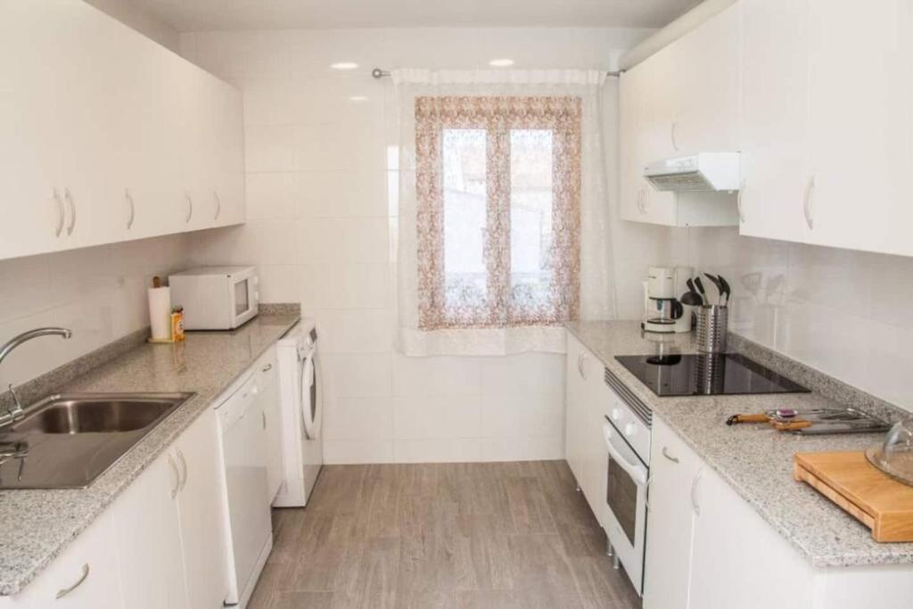Kuchyň nebo kuchyňský kout v ubytování Villa Son Serra