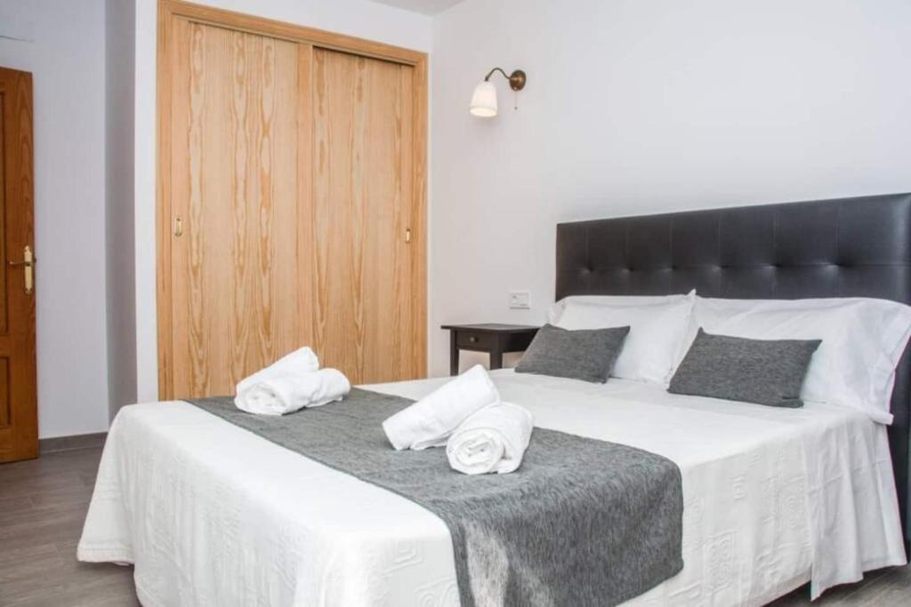 Postel nebo postele na pokoji v ubytování Villa Son Serra