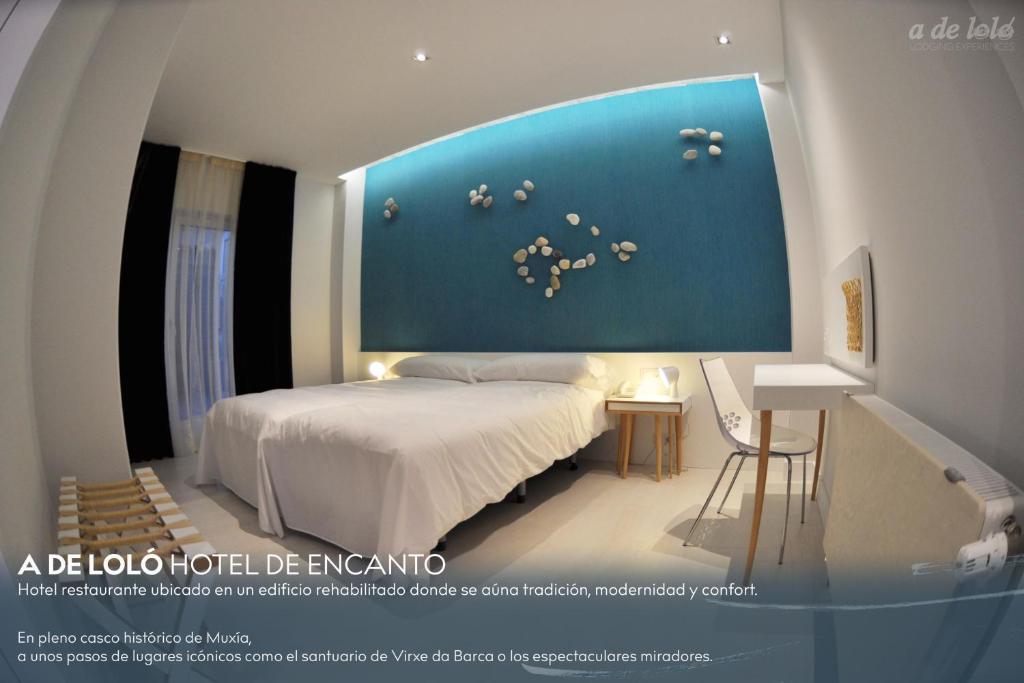 Ένα ή περισσότερα κρεβάτια σε δωμάτιο στο A de Loló Alojamiento con encanto