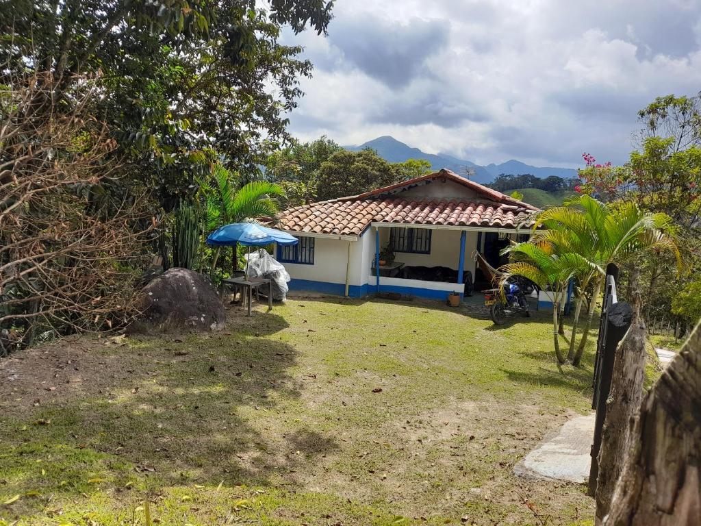 a small house with a blue and white at Casa Horizontes in San Carlos