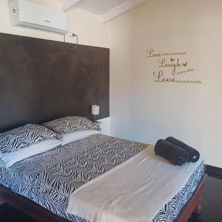 Postel nebo postele na pokoji v ubytování B&B Le Villette Las Lajas