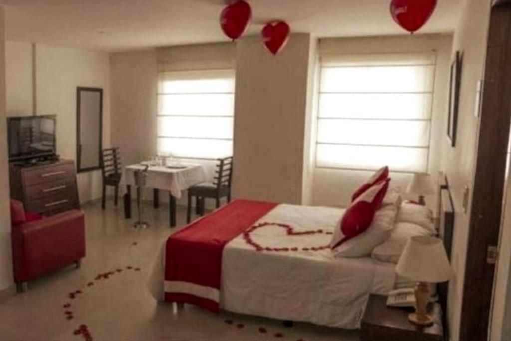 Letto o letti in una camera di AW Hotel Chipichape Urban