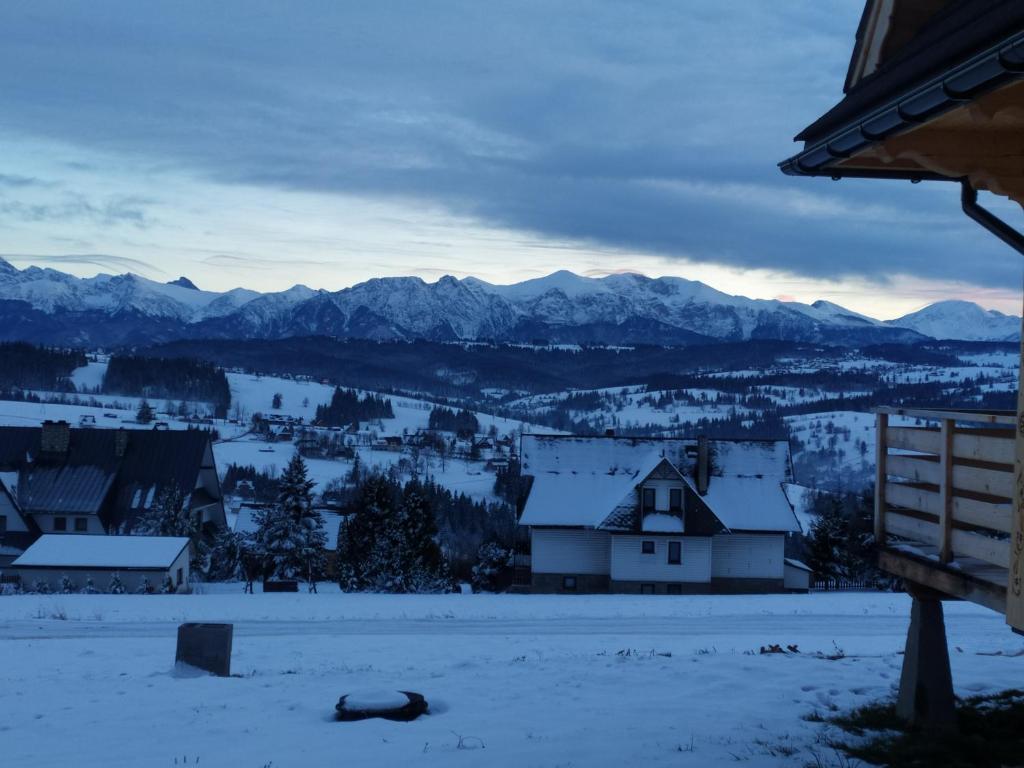 a view of a town in the snow at Domek na Bachledówce in Czerwienne