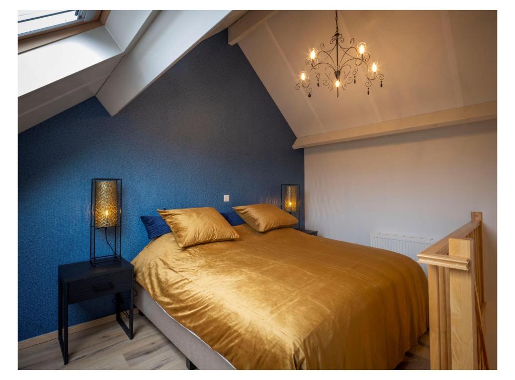Postel nebo postele na pokoji v ubytování B&B De Floreffe
