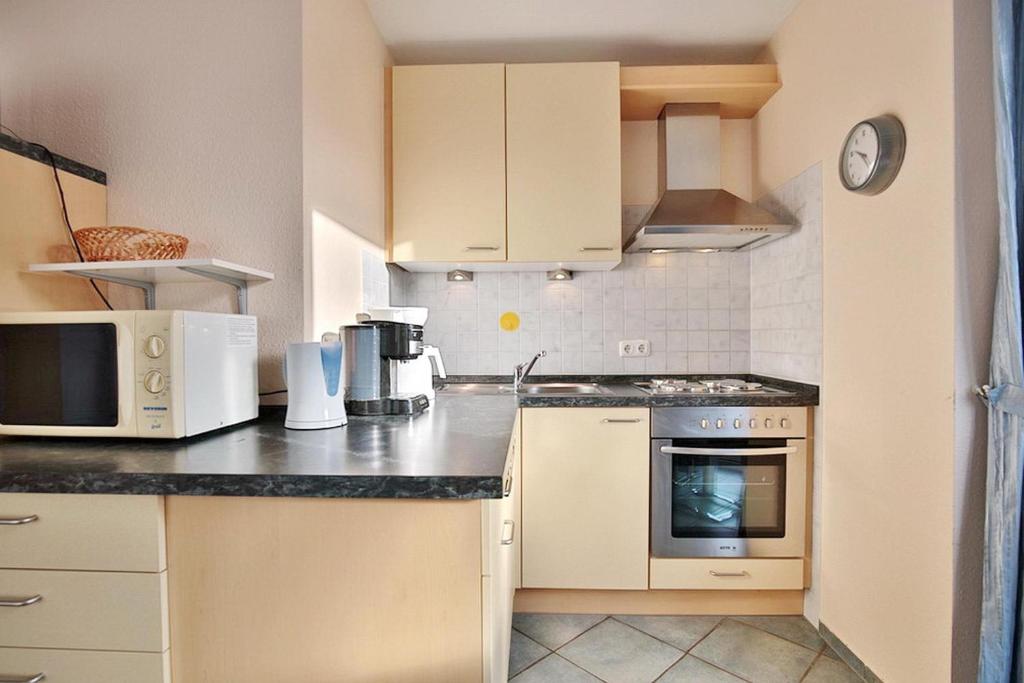 Kuchyň nebo kuchyňský kout v ubytování Gorch-Fock-Straße 16 Gorch-Fock-Str 16 Appartement 1