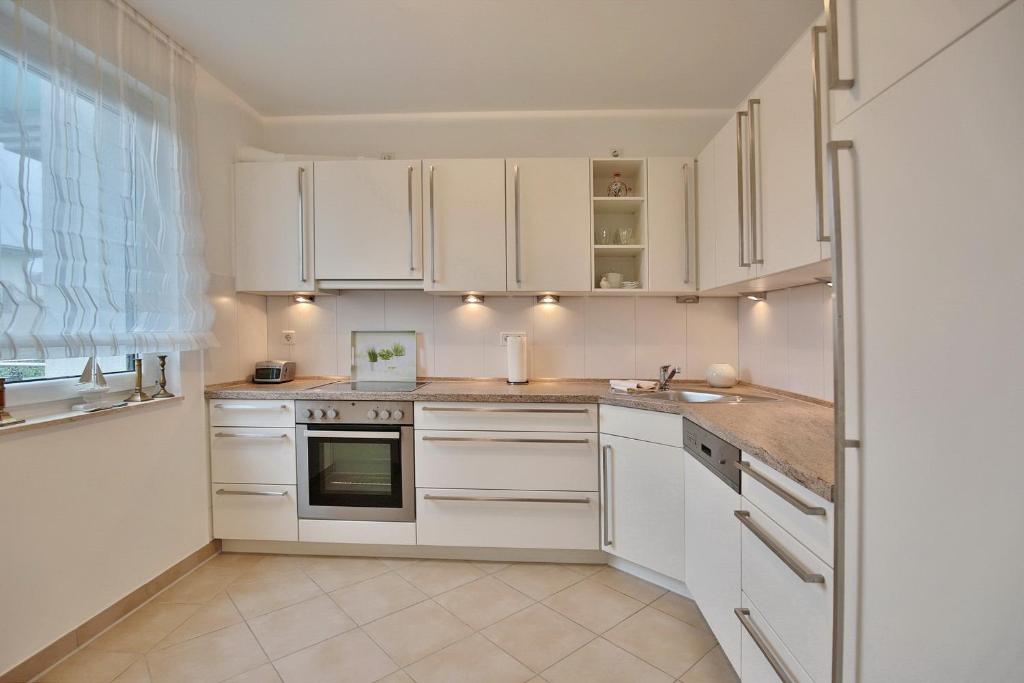 Kuchyň nebo kuchyňský kout v ubytování Villa Mér Baltique Villa Mér Baltique Appartement 12