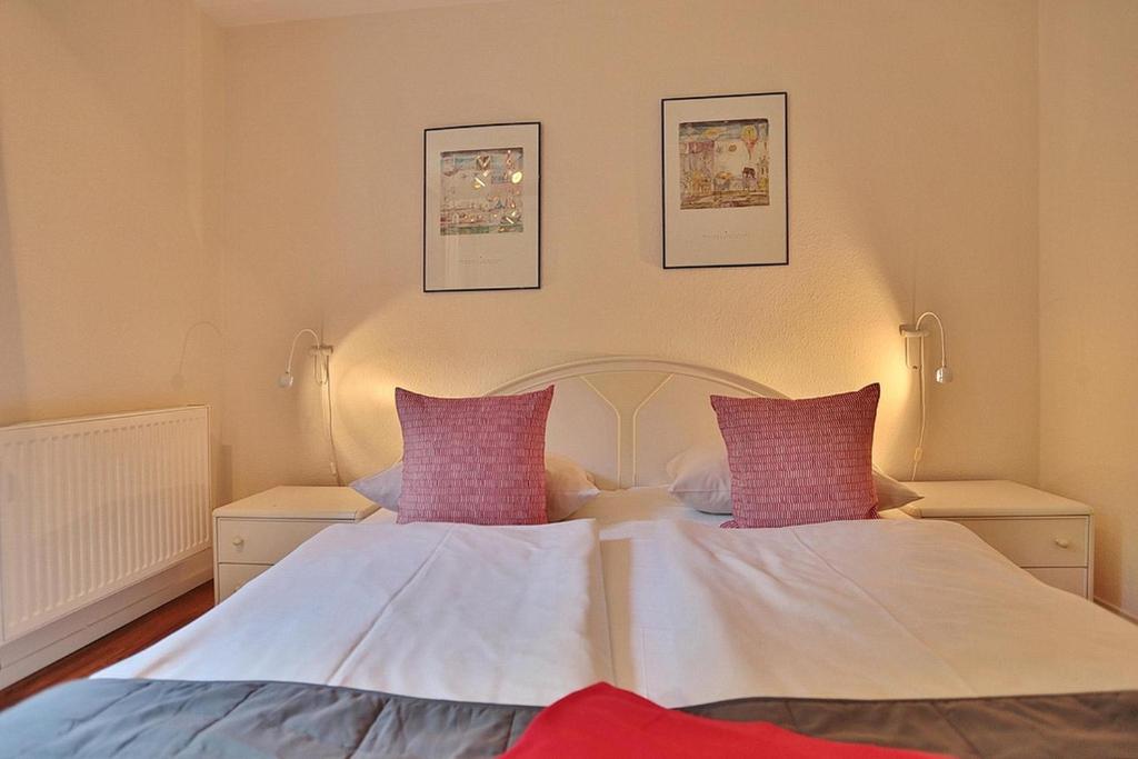 Postel nebo postele na pokoji v ubytování Gorch-Fock-Straße 16 Gorch-Fock-Str 16 Appartement 2