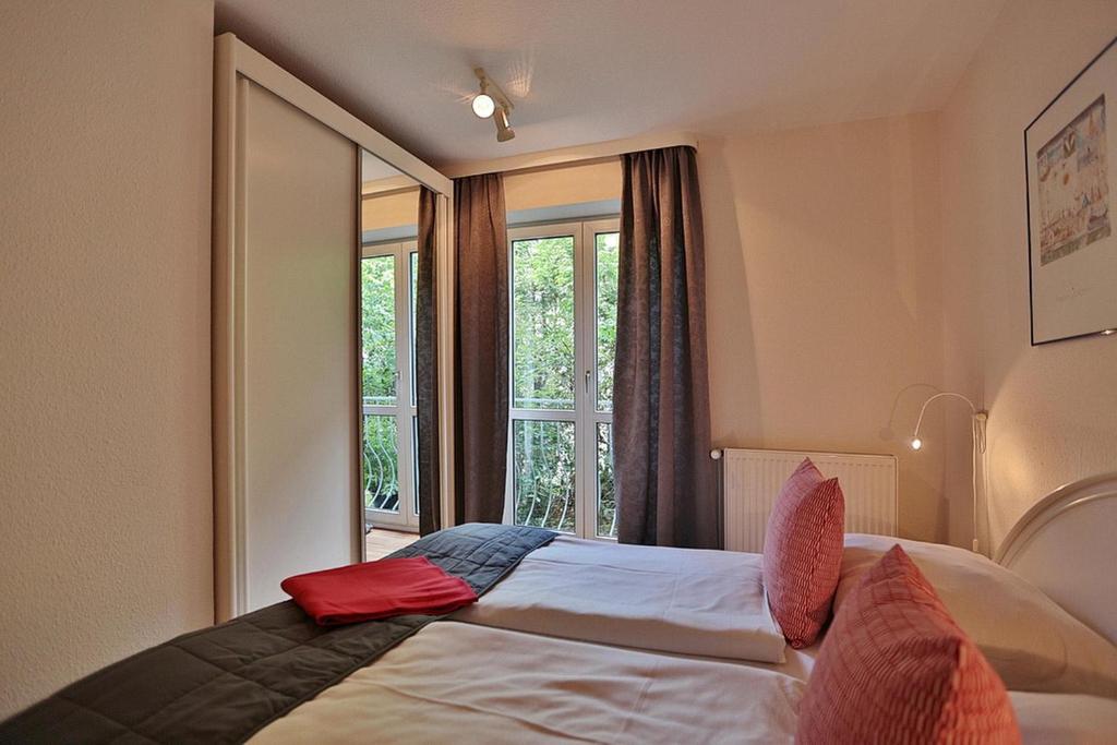 Postel nebo postele na pokoji v ubytování Gorch-Fock-Straße 16 Gorch-Fock-Str 16 Appartement 2