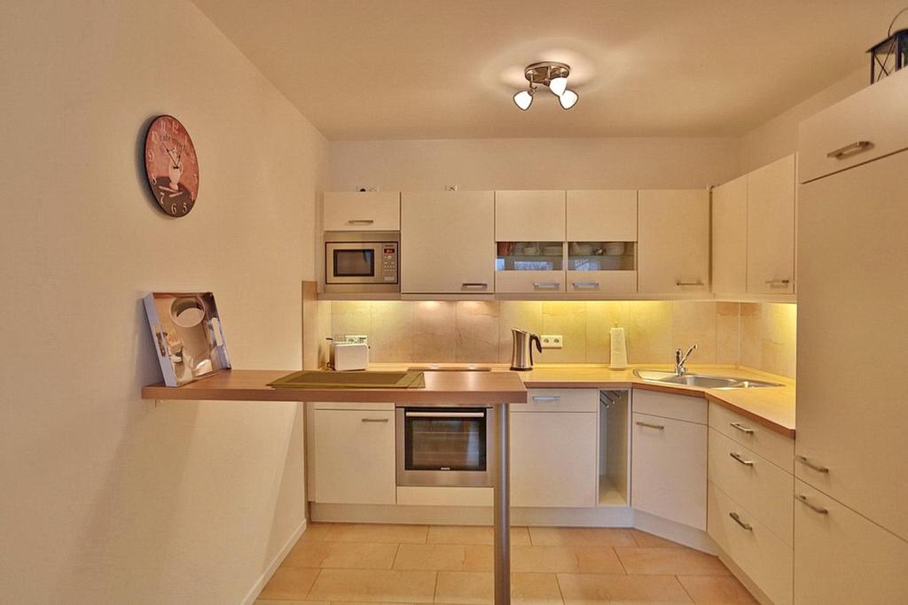 Kuchyň nebo kuchyňský kout v ubytování Villa Mér Baltique Villa Mér Baltique Appartement 20