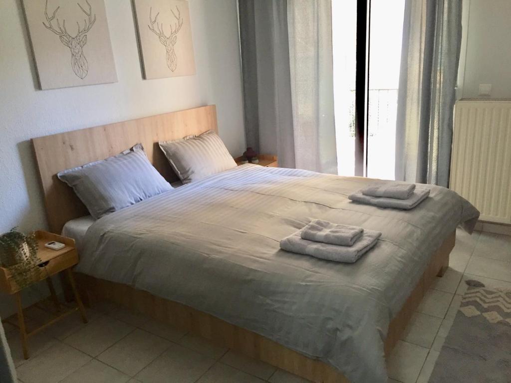 Postel nebo postele na pokoji v ubytování Nikoletta's Home 2