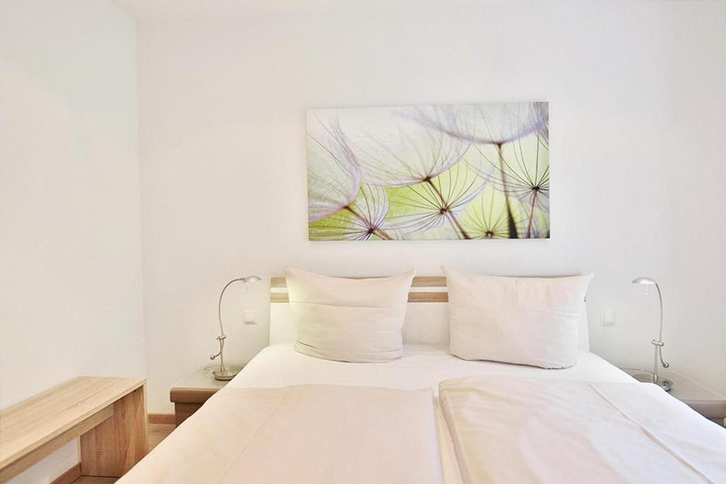 Postel nebo postele na pokoji v ubytování Parkresidenz Bergstraße 52 Parkresidenz Bergstraße 52 Appartement 2