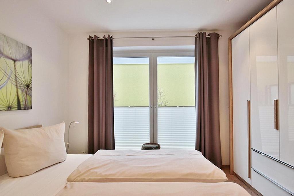Postel nebo postele na pokoji v ubytování Parkresidenz Bergstraße 52 Parkresidenz Bergstraße 52 Appartement 2