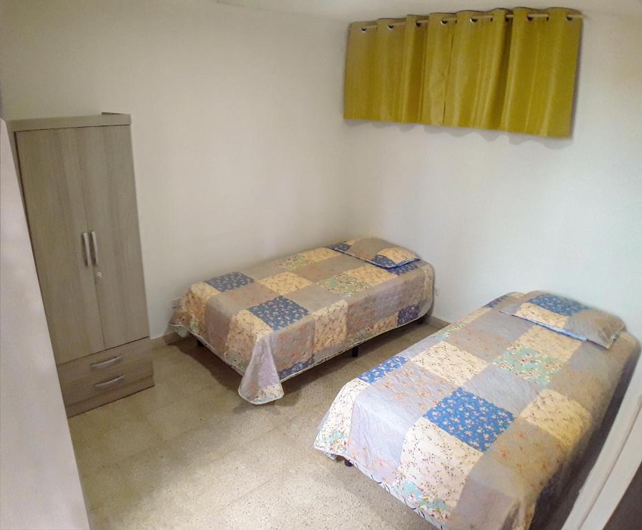 Postel nebo postele na pokoji v ubytování Habitaciones privadas en un departamento encantador