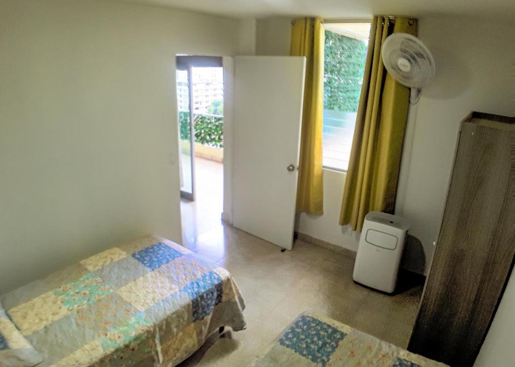 Postel nebo postele na pokoji v ubytování Habitaciones privadas en un departamento encantador