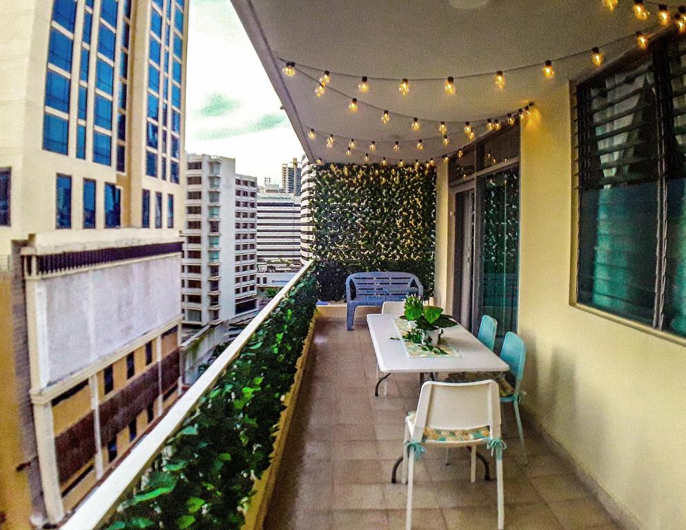 Balkón nebo terasa v ubytování Habitaciones privadas en un departamento encantador
