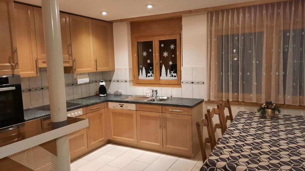 Kuchyň nebo kuchyňský kout v ubytování Aquarell Apartments